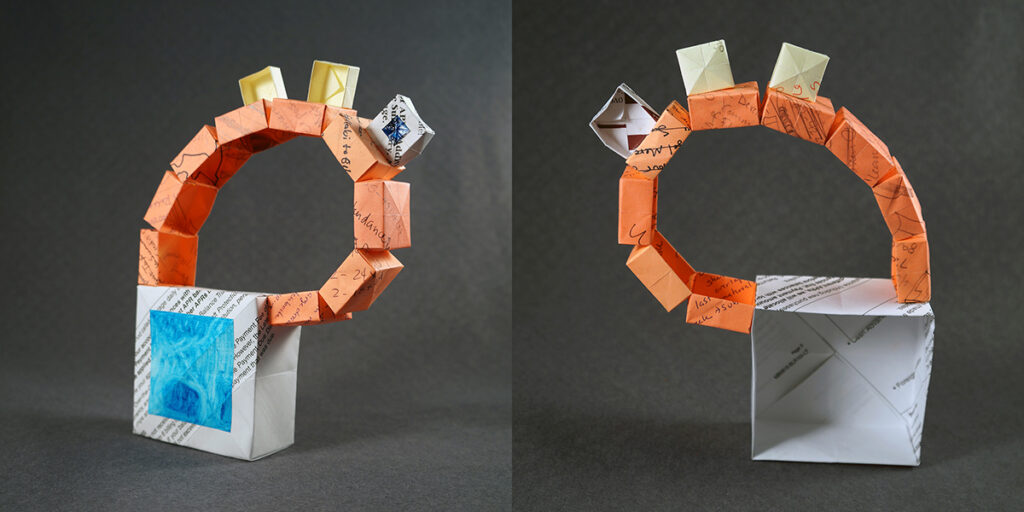 Two views of a small sculpture by artist Joanna White, featuring paper boxes and paint.