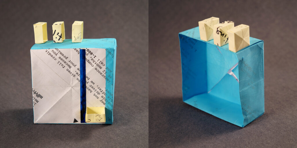 Two views of a small sculpture by artist Joanna White, featuring paper boxes and paint.