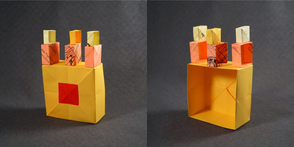 Two views of a small sculpture by artist Joanna White, featuring paper boxes and paint.
