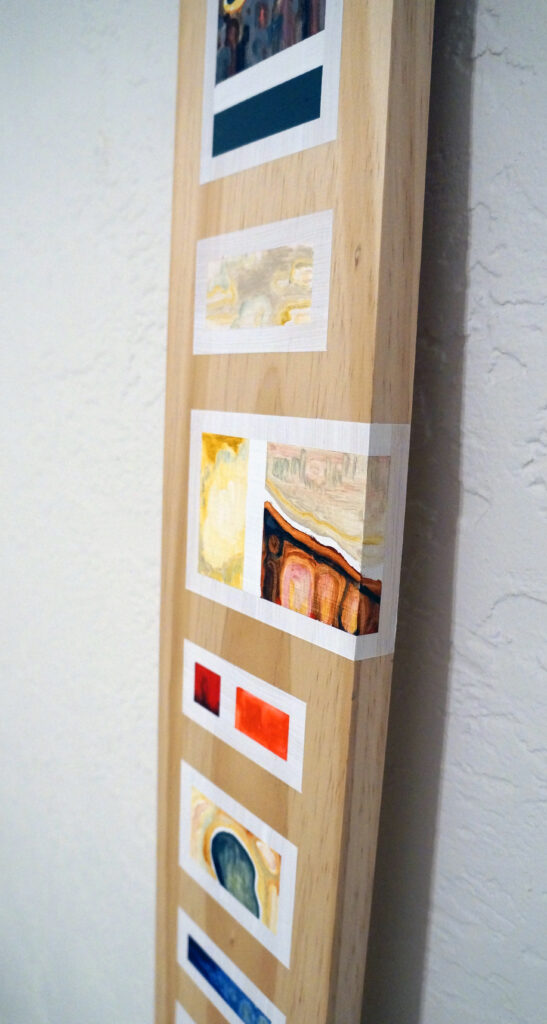 A detail of a Storyboard painting by Joanna White, showing the painting wrapping around the side of a pine board.